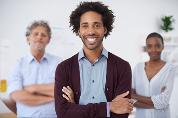 Image showing Man, smile and portrait in office with colleagues for meeting, research and career for organisation, agency or company. Diverse, team and coworkers for planning, teamwork and profession for collab