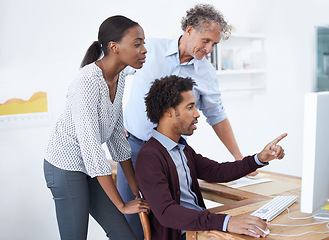 Image showing Coworkers, team and computer in office for web design, brainstorm and research for business. Diverse group or people and point with tech for info or advice together with technology and internet