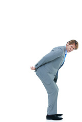 Image showing Businessman, portrait and back with pressure, workload or carrying invisible weight on a white studio background. Isolated man, employee or model holding something heavy for business on mockup space