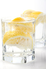 Image showing glasses with soda water and lemon