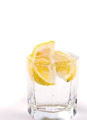 Image showing glass with soda water and lemon