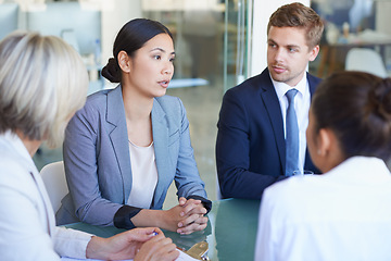 Image showing Business meeting, conversation and corporate consulting with discussion for project and teamwork. Staff, working and company with planning and professional talk at a desk in a consultant office