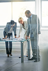 Image showing Business meeting, property project and corporate work with discussion for job and teamwork. Staff, management and company with planning and professional talk at a desk with real estate law office