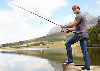 Image showing Fishing, pole and portrait of mature man in nature for travel, or stress relief at lake on vacation, holiday or trip. Fish, line and person at outdoor river for water, adventure or peace in a forest