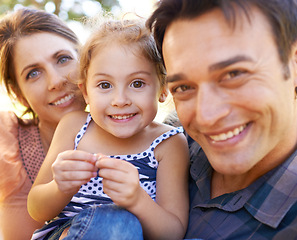 Image showing Family, parents and portrait with child in park happy for bonding, healthy relationship and relax on Saturday. Smile, father and mother with daughter for selfie in nature, dad and mom with young girl