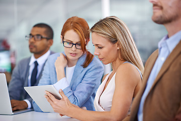 Image showing Business, woman and teamwork in meeting with tablet or presentation for corporate research or online notes. Entrepreneur, people or employees in conference for training, workshop or b2b collaboration