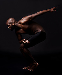 Image showing Body, stretching and man on dark background with health, wellness and fitness or ready for running in studio. Young person, athlete or african model in art deco for dance, training or muscle training