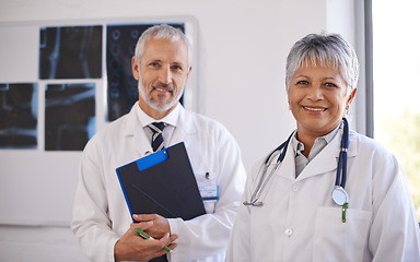 Image showing Doctor, checklist and portrait in hospital with teamwork for xray results, medical advice and support. Healthcare, radiology and mature employees with collaboration for report, consultation or review