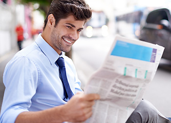 Image showing Smile, businessman and reading newspaper for information, daily news and updates on local events. Professional, male person and outdoor with article for knowledge, stories and newsletter in city