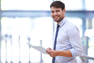 Image showing Smile, tablet and portrait of man in office for business research, feedback and job pride. Professional person, technology and happy with confidence for digital schedule, email and communication