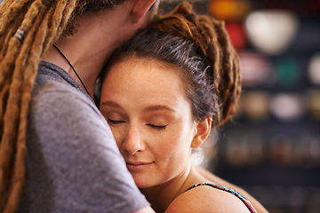 Image showing Hug, rasta and home with couple, marriage and bonding together with happiness and relaxing. Peaceful, apartment and embrace with romance and dreadlocks with relationship and love with man and woman