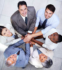 Image showing Business people, portrait and team huddle for hands, community and support or unity. Colleagues, diversity and agreement in collaboration or alliance at work, solidarity and cooperation in office