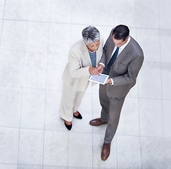 Image showing High angle of tablet, business and strategy with collaboration, employee and entrepreneur. Man, woman and corporate for company, discussion and meeting for online enterprise or accounting firm