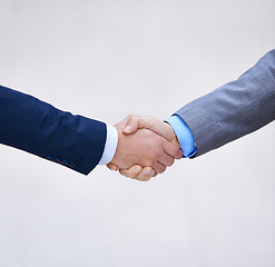 Image showing Closeup, business people and handshake for deal, collaboration and b2b partnership agreement for consultant. Welcome, introduction and shaking hands for support, thank you or mockup space in office