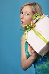 Image showing Woman holding a gift
