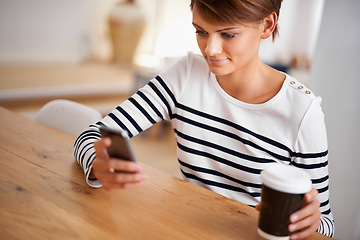 Image showing Cellphone, smile and woman with coffee in dining room networking on social media, mobile app or internet. Happy, technology and female person with cappuccino scroll on a phone at modern apartment.