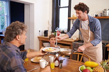 Image showing Gay, couple and child in kitchen for breakfast with happiness in morning to eat for bonding, support and care. Adoption, family and mature men for meal with coffee, table and enjoy together with love