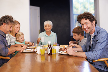 Image showing Mature man, family and guest for breakfast at home on happiness in morning for bonding with conversation, support and care. Portrait, meal and eat with coffee in table to enjoy, fun and together.