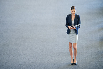 Image showing Business woman, documents and lawyer in office, reading and planning for above in workplace. Female person, agency and paperwork for opportunity in firm for startup company, advocate and tasks