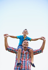 Image showing Father, young boy and shoulders of parents, sky and outdoors in park with smile. Laugh, love or bonding for son and dad with family, spring and carrying his child in summer and spending time together