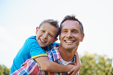 Image showing Piggyback, portrait and dad with kid to play outdoors for bonding, love and happiness in garden for fathers day. Parent, son and together with care for summer fun in backyard with shoulder game