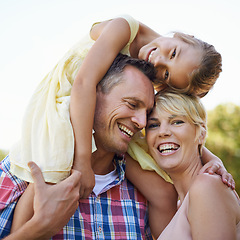 Image showing Family, happy and shoulder of parents and daughter, mother and portrait outdoors in park. Smile, love and bonding with young child in spring, affection and father carrying girl for care and support