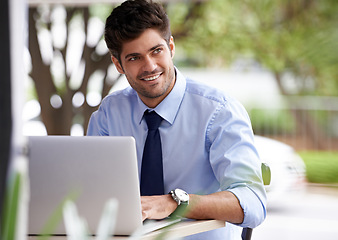 Image showing Laptop, thinking and remote working businessman, smile and outside cafe for online work. Pensive, internet and technology for email for professional male person, notes and reports or paperwork