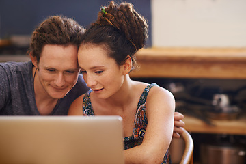 Image showing Home, couple and typing with laptop, connection and planning with online reading and research. People, apartment and love with man and woman with computer and internet with technology and email