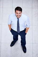 Image showing Business, portrait and high angle of man in office with professional confidence and pride. Above, entrepreneur and person in lobby to start morning in London at corporate workplace with perspective