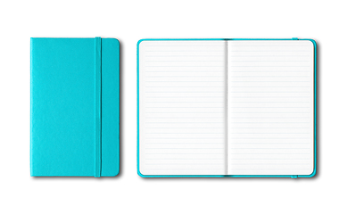 Image showing Aqua blue closed and open lined notebooks isolated on white