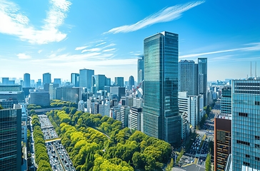 Image showing Urban growth meets blue skies