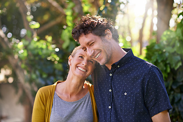 Image showing Love, laugh and happy couple hug in park for fun, bonding or vacation together in nature. Travel, comic and funny people embrace in forest with care, trust or support, joke or fresh air in Australia