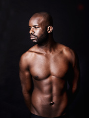 Image showing Black man, shirtless and body with abs in studio, fitness and health with muscle isolated on dark background. Exercise, sport and athlete with six pack, confident and masculine with testosterone