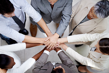 Image showing Group, top view or business people with hands in stack for mission goal, collaboration or teamwork. Team building, unity circle or above of employees in meeting with support, solidarity or motivation