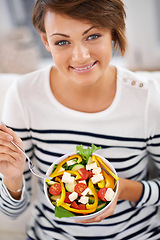 Image showing Woman, salad and healthy vegetables in portrait for diet with detox, breakfast and lunch at home. Young person eating food, lettuce and green fruit or vegan meal in a bowl for nutrition and wellness