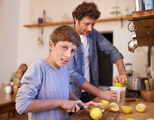 Image showing Father, child and lemon juice or fruit in kitchen or lemonade preparation or healthy beverage, vitamin c or gut health. Son, portrait and male person with tool or family, drinking or ingredient