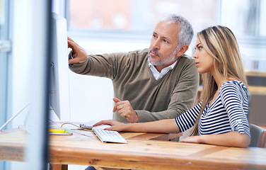 Image showing Business people, monitor and training by computer in office, mentorship and discussion on company proposal. Man, woman and communication of online research for project manager and teamwork by desktop