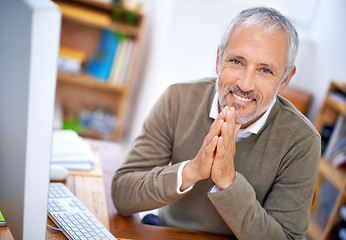 Image showing Senior, businessman and portrait of ceo at desk with happiness, experience and confidence in office. Entrepreneur, face or executive at workspace with smile for corporate career or company management