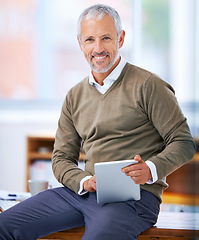 Image showing Portrait, happy and businessman with tablet in office for website research on internet. Smile, reading and mature financial planner work on budget project with digital technology in workplace.