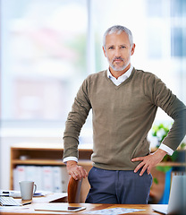 Image showing Senior, businessman and portrait of ceo at desk with confidence, experience and mockup space in office. Entrepreneur, face and boss at workspace with smile for corporate career and company management