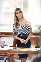 Image showing Woman, desk and smile with portrait, agency and professional for work or business. Accountant, technology and files for workspace, administration or corporate or startup career with job and happiness