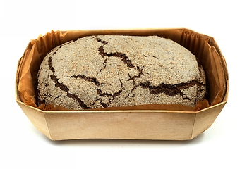 Image showing loaf of fresh rye bread in a wooden box