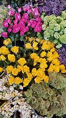 Image showing A bunch of flowers on a table