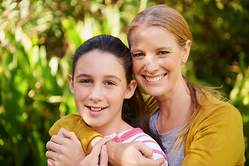 Image showing Girl, mother and hug in portrait in park with smile, support and outdoor bonding in nature together. Women, family and face of happy teen with mom in garden with love, weekend and trees in backyard