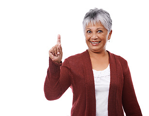 Image showing Portrait, smile and pointing up with senior woman, choice and model isolated on a white studio background. Face, pensioner and mature lady with hand gesture and options with opportunity and promotion