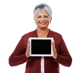 Image showing Portrait, senior woman and tablet with screen, promotion and model isolated on a white studio background. Face, pensioner and old lady with technology and mockup space with opportunity and showing