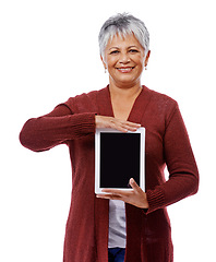 Image showing Portrait, mature woman and tablet with screen, smile and model isolated on a white studio background. Face, pensioner and senior lady with tech, promotion or mockup space with opportunity and showing