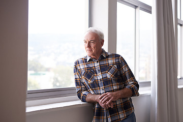 Image showing Thinking, mature man and smile in home window with memory, moment and relaxing. Remember, face and elderly male in living room with nostalgia, reflection and chilling in retirement with happiness