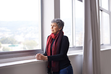 Image showing Window, thinking and senior woman with sunshine, ideas or retirement with nostalgia and memory. Old person, mature lady or pensioner with view or peace with wonder or thoughts with decision or choice