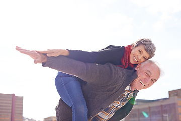 Image showing Portrait, mature couple and piggyback or romantic on vacation, retirement holiday and celebrate with smile. Happy, elderly people and marriage or love for bonding, care and romance in relationship